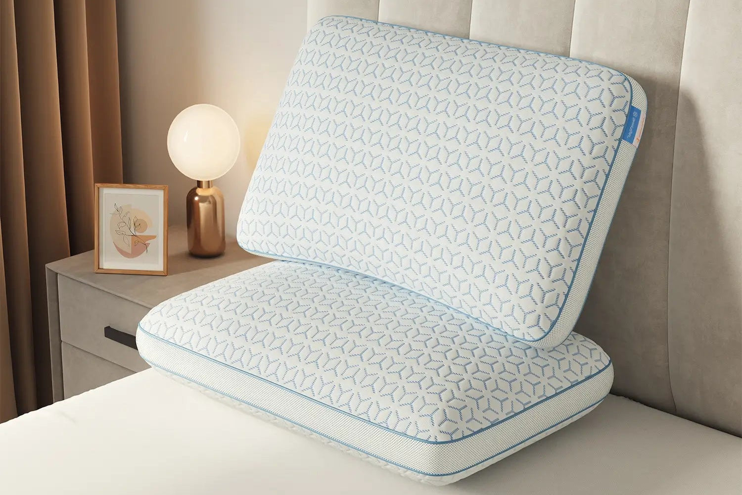 Cooling memory foam pillow with blue geometric pattern, soft and comfortable for sleep.